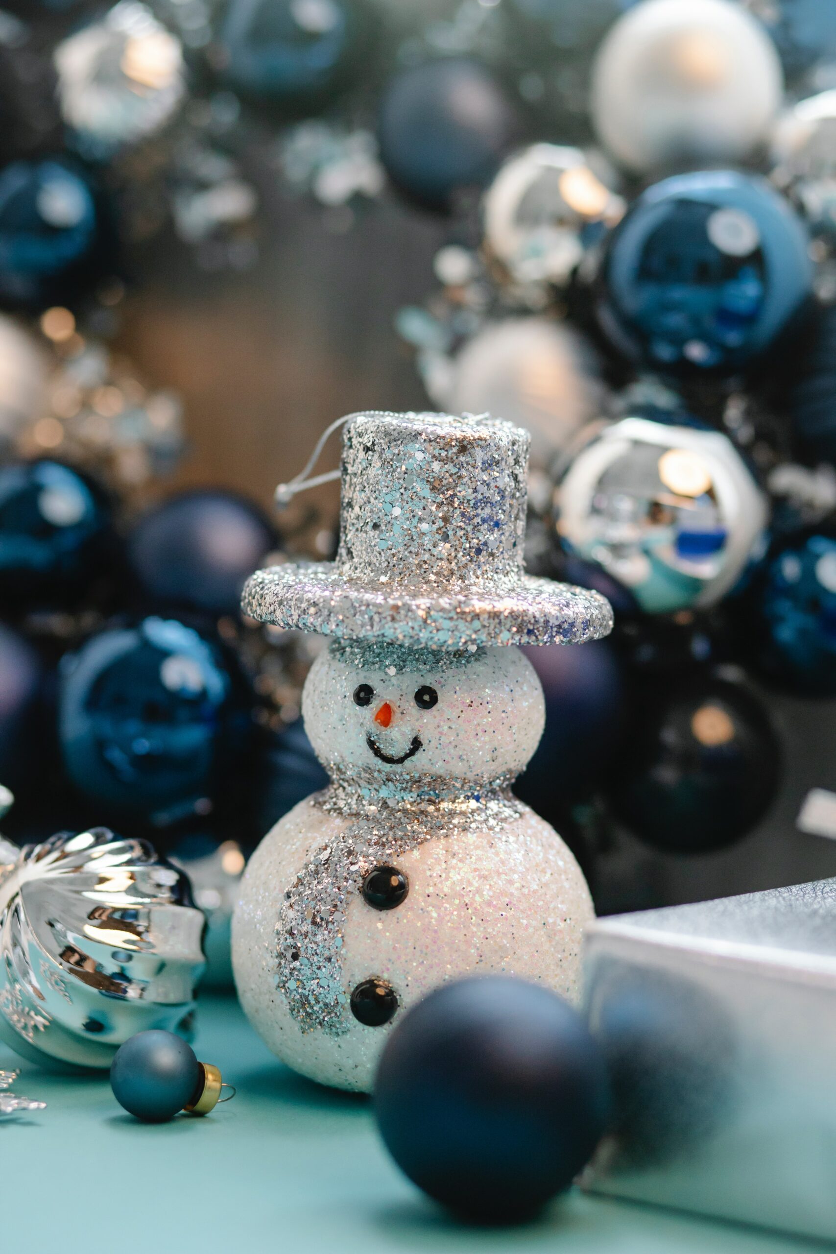 snow man decoration with silver hat