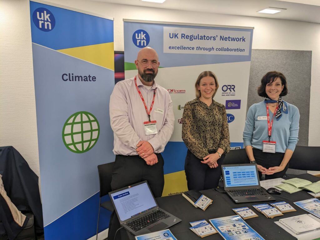 Mark Austin and two representatives from the CAA at the UKRN event stall.