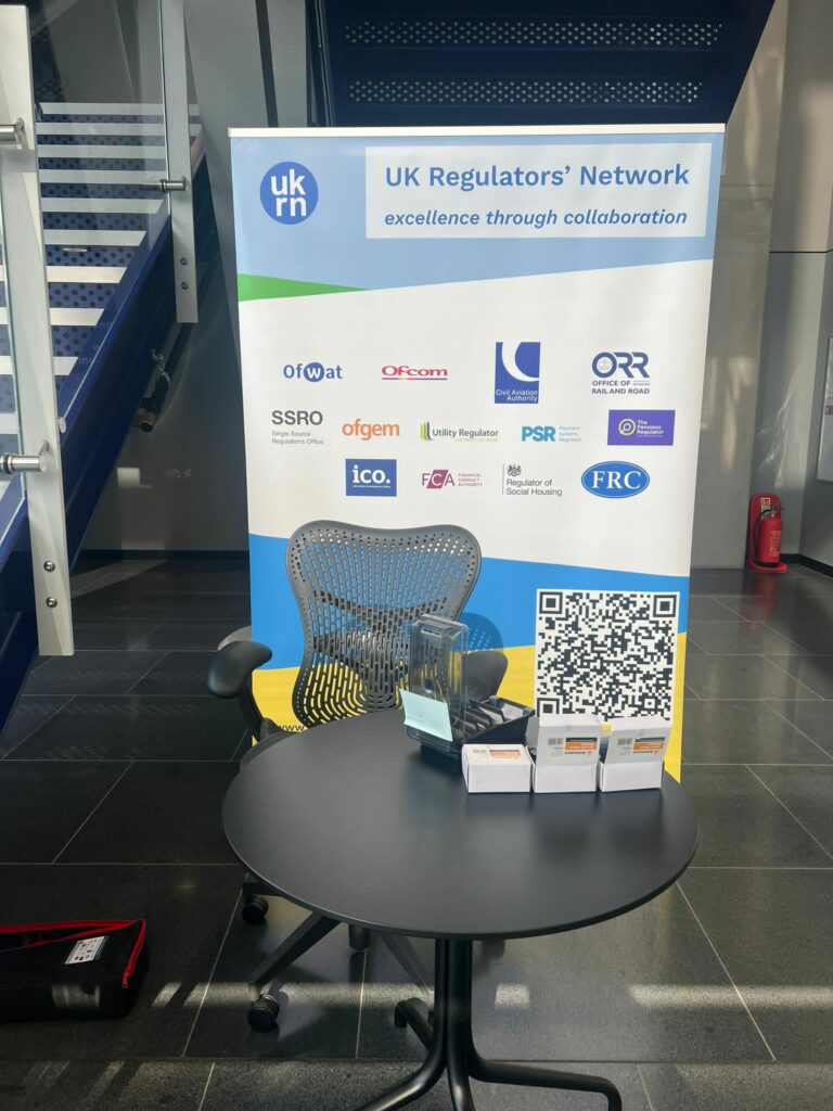 check-in desk and UKRN banner