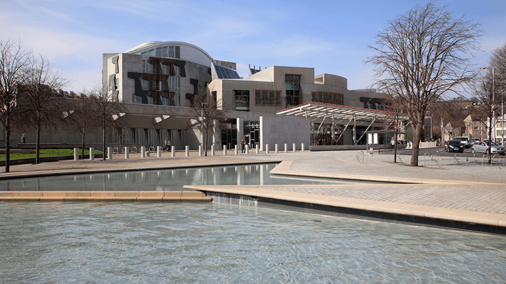 The Scottish Parliament Building is the home of the Scottish Parliament at Holyrood, within the UNESCO World Heritage Site in central Edinburgh. The complex is a campus of several buildings reflecting different architectural styles. The building was designed by Enric Miralles and is a mixture of steel, oak, and granite.