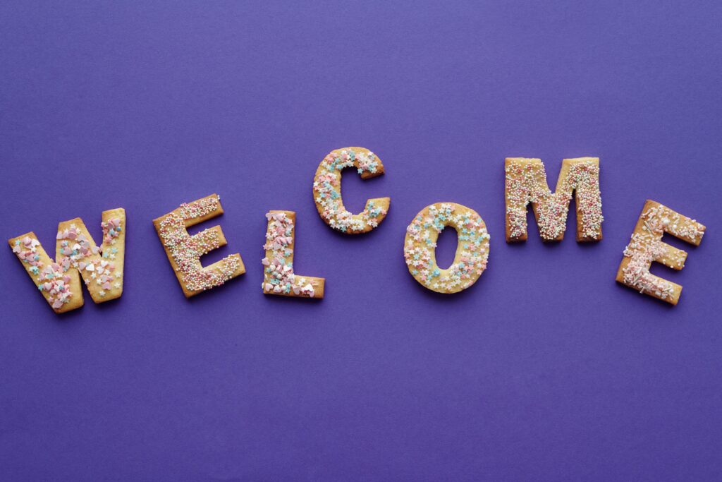 decorated biscuits letters spelling the word WELCOME